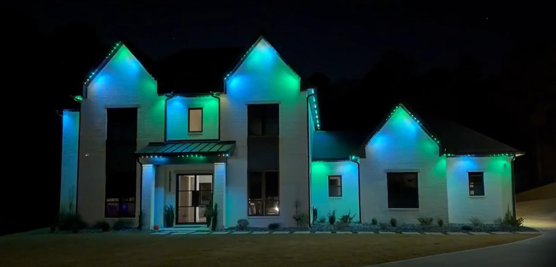 Home with colorful permanent architectural lighting